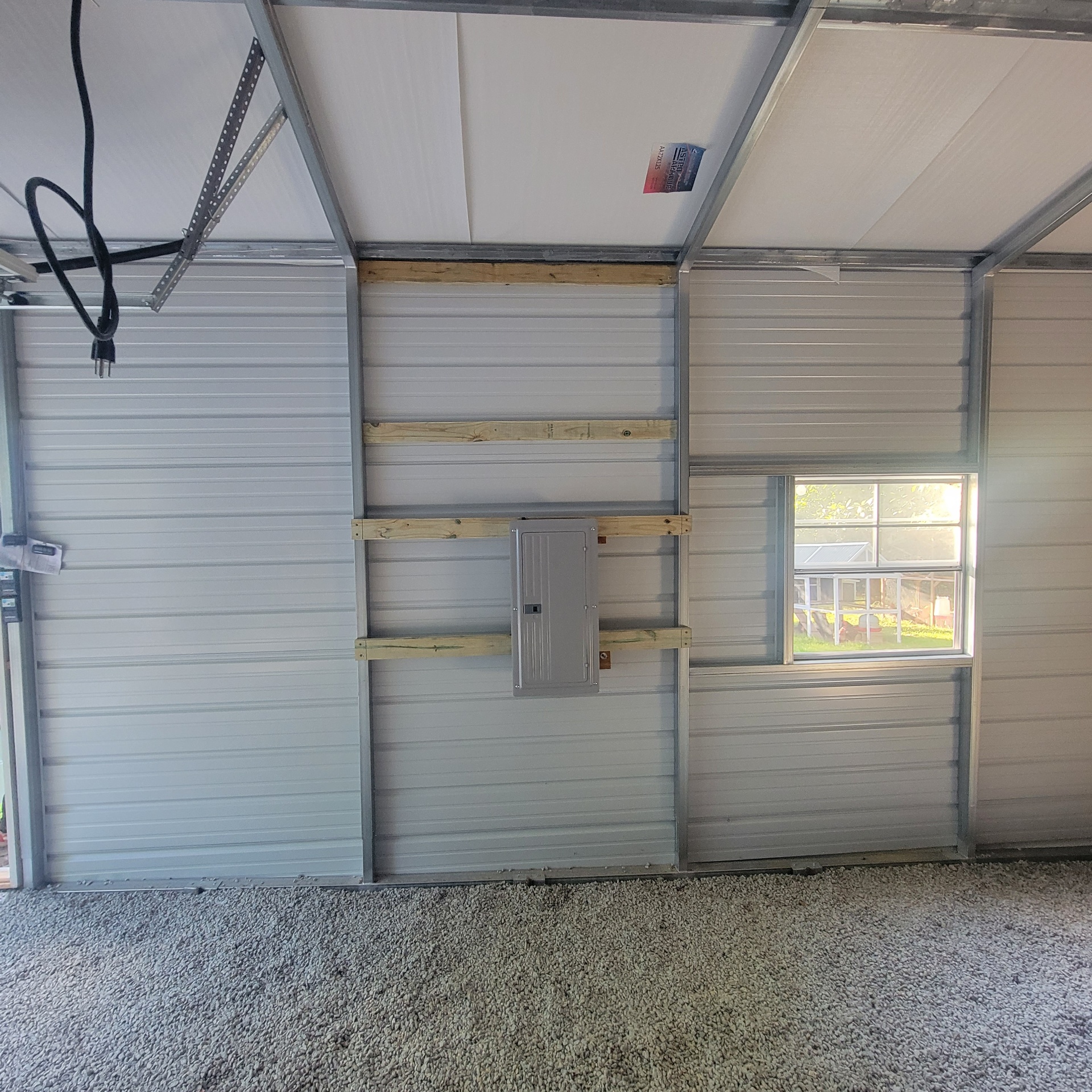 Garage Electrical Panel Installation with Metal Framing